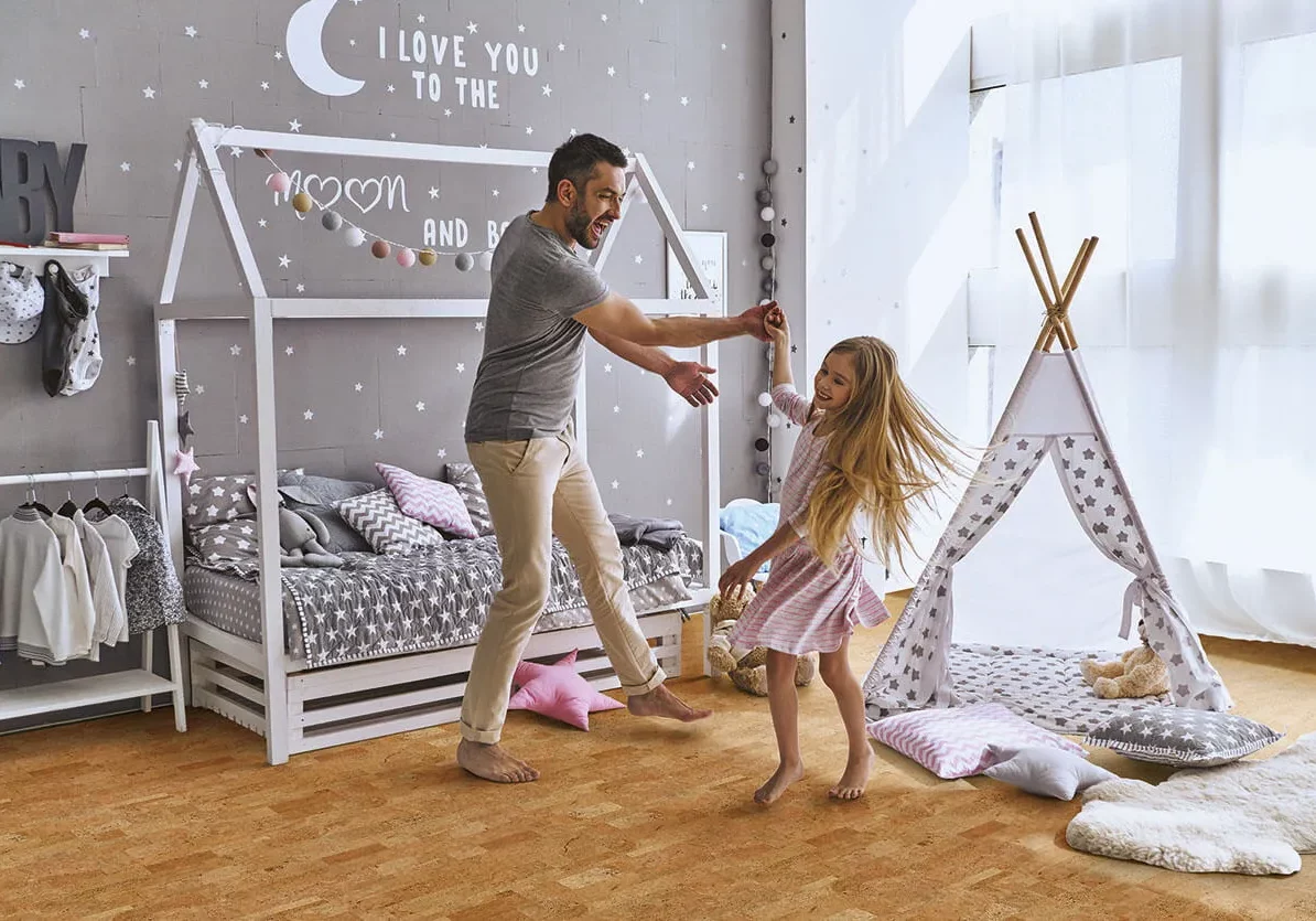 Cork Flooring in bedroom with Father and Child | Vic's Carpet & Flooring