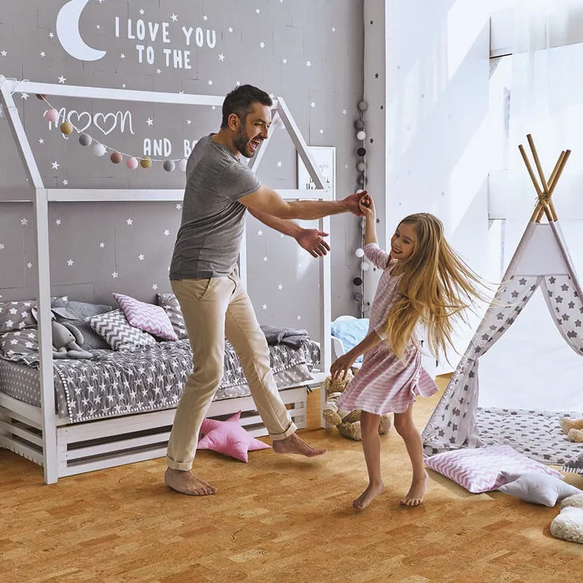 Cork Flooring in bedroom with Father and Child | Vic's Carpet & Flooring