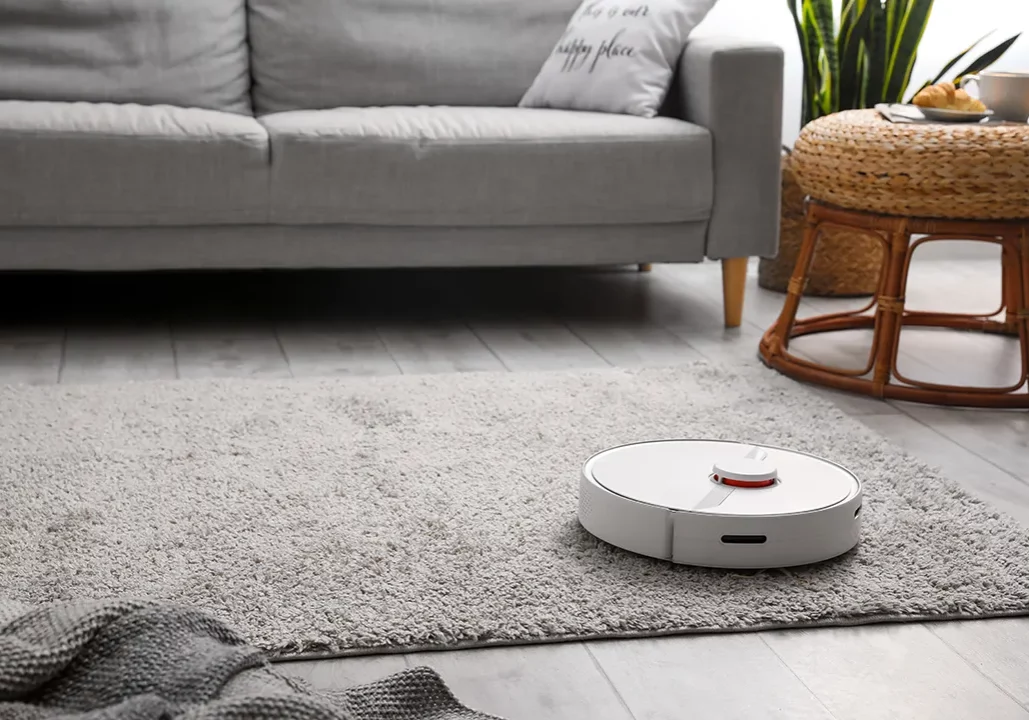 Robot Vacuum on area rug | Vic's Carpet & Flooring